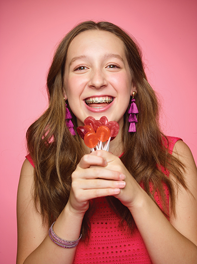 Alina Morse holding Zollipops