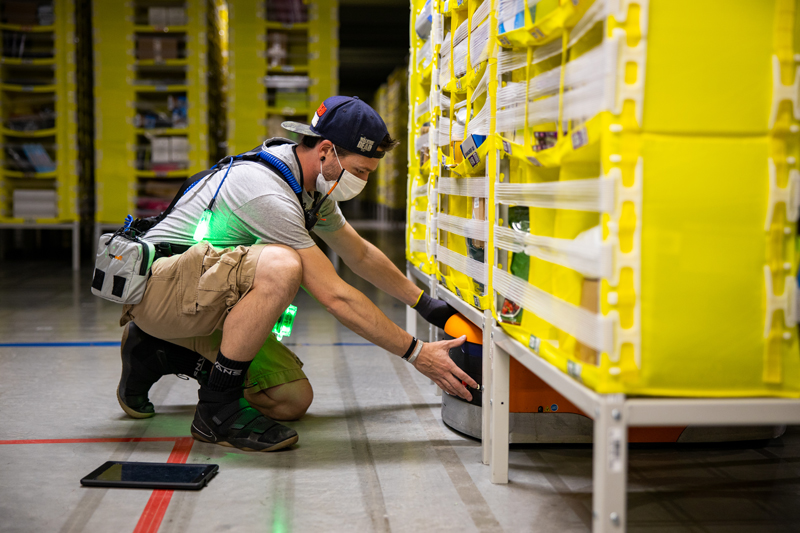 Amazon worker in delivery facility