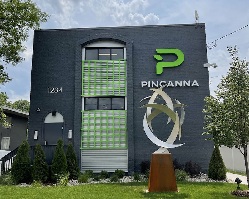 the front facade of a new Pincanna retail location in east lansing