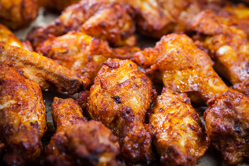 Michigan-based fast-casual chicken wing restaurant Wing Snob announced a deal for 25 Michigan franchises over the next four years. // Stock Photo