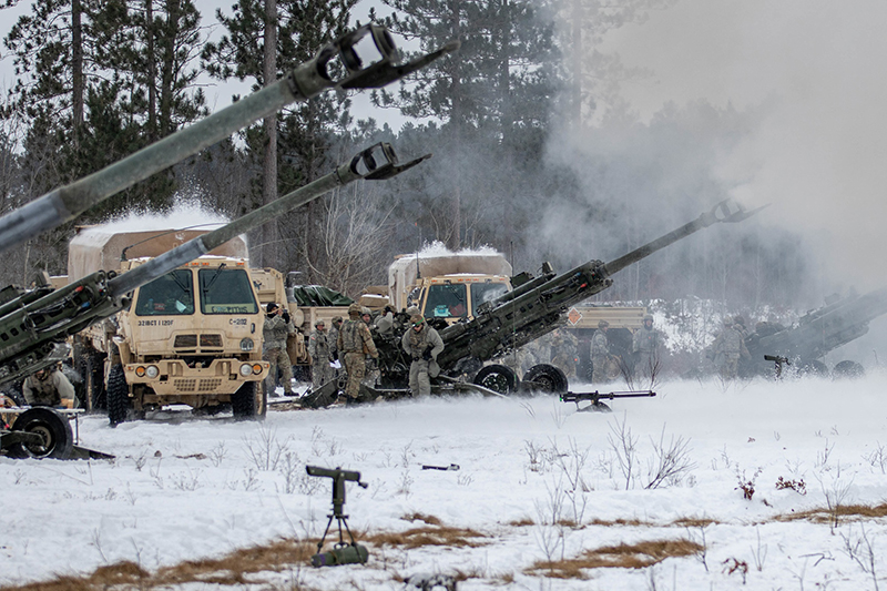 Firing Line - Charlie Battery, 120th Field Artillery Regiment, 32nd Infantry Brigade Combat Team, Wisconsin National Guard, conducted a fires mission at Camp Grayling in January. The event took place during Northern Strike 22-1, a National Guard Bureau exercise with participants from several U.S. states and partner forces. // Courtesy of U.S. Army National Guard/Capt. Joe Legros